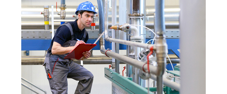 service technician making onsite production evaluation 